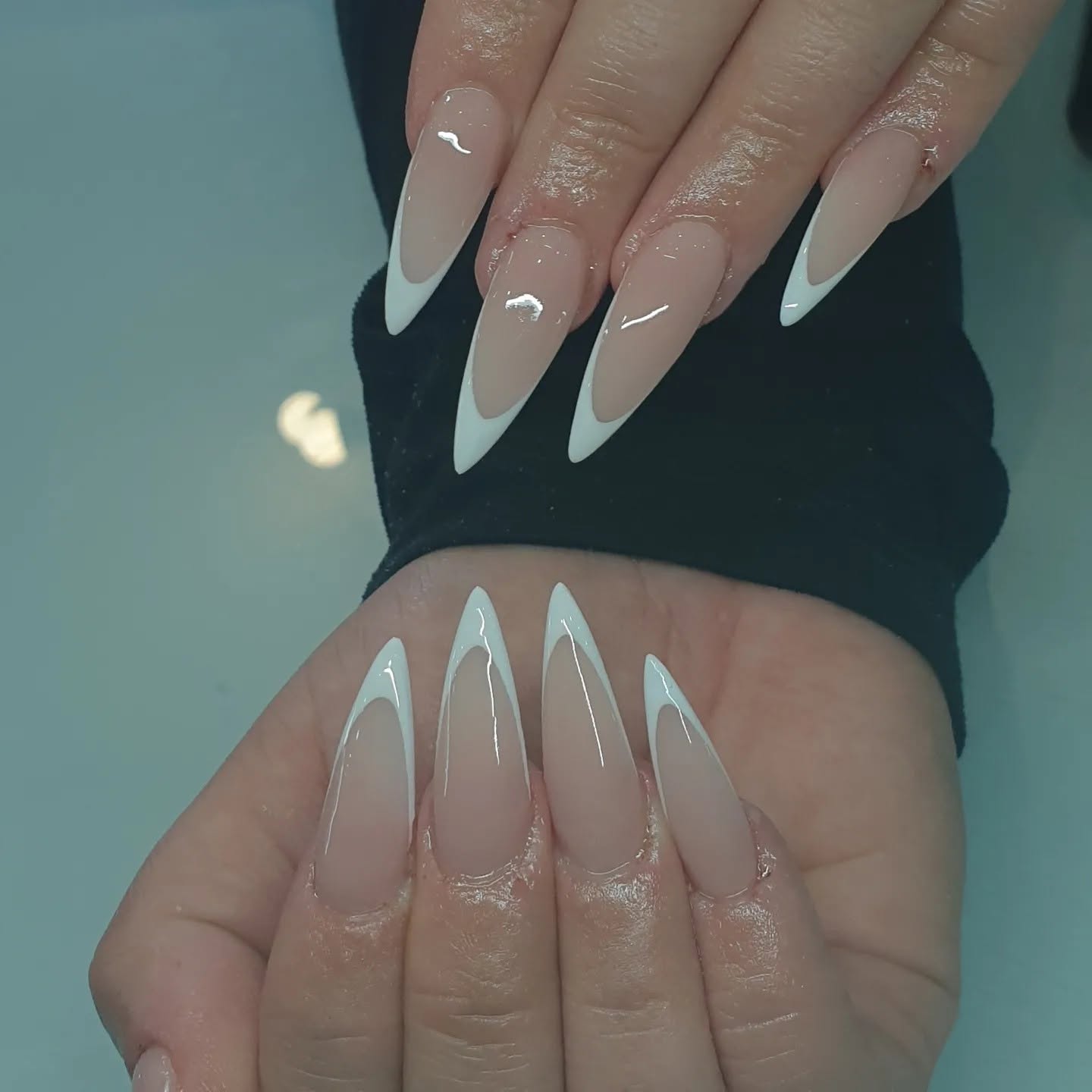 Almond French tip gel manicure created at Studio J, Swords